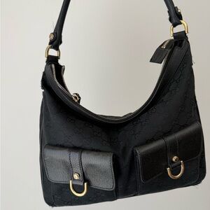 Gucci Elegant Black Shoulder Bag with Gold Accents